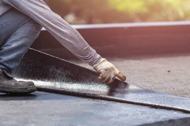Professional Basement Waterproofing technician working in Franklin Square, NY